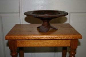 Platter on a stand. Turned from a burl. Redgum and Quila. 