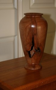 Vase. Features natural bark incursion. Peppermint.