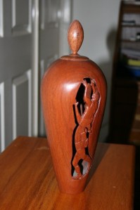 Vase. Carved AFL features with Aussie rules football. Jarrah.