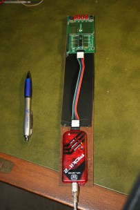 The PICkit 2 programmer connected to the programming board.
